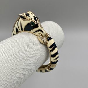 Hinged Zebra Enamel Bracelet With Clear Rhinestonsand Green Rhinestone Eyes